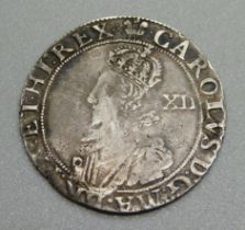 A Charles I shilling, c1644-1645, oval shield with CR above