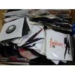 A large box of 1970s and 1990s 7" singles