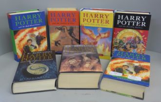 Seven Harry Potter books; six First Editions