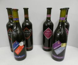 Three bottles of Rosemount Estate Merlot and three bottles of Shiraz wine