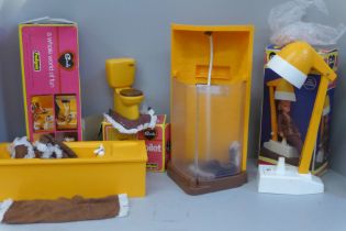 A collection of Sindy furniture, bath, toilet, shower and hairdryer, boxed