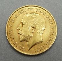 A George V 1911 gold half-sovereign,