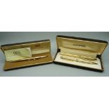 A Sheaffer gold plated pen set, ink pen with 14ct gold nib and a Cross ballpoint pen, both cased