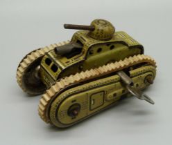 A D.R.G.M. German tin-plate clockwork toy tank, marked Gama, with key, 72mm long