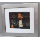 A Daniel Craig signed photograph with Certificate of Authentication
