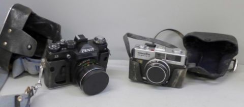 A Zenit 11 camera and a Minolta Hi-Matic F camera