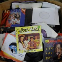 A large box of 1970s and 1980s 7" singles