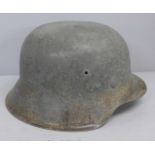 A German M42 helmet with inner leather replaced