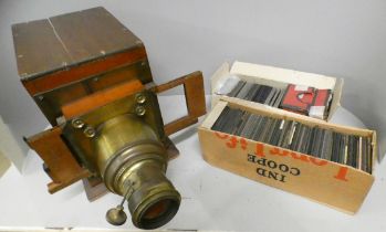 A part Magic Lantern projector and a collection of Magic Lantern slides (117) including travel,