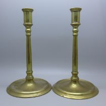 A pair of Regency brass candlesticks, 19cm