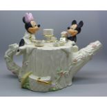 A Disney Mickey and Minnie tea pot
