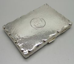 A hammered silver card case, Birmingham 1904, with initials, 70mm x 101mm