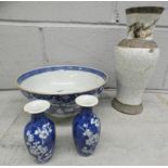 A Chinese blue and white bowl, a/f, a pair of small blue and white vases, chips to rims and one