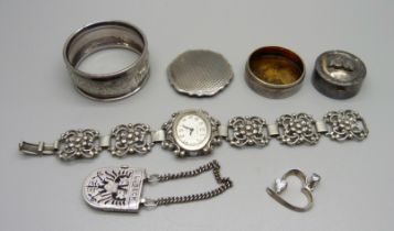A hallmarked silver pill box, Birmingham 1933, a lady's Prima 835 silver cocktail wristwatch, a