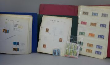 An album of British stamps including 19th Century, one other album of British stamps and an album of