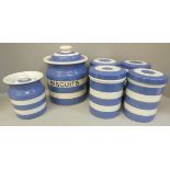 Six T.G. Green storage jars, 'Biscuits' with black stamp, a/f, and five un-named with green back