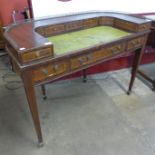 A Regency style inlaid mahogany Carlton House desk