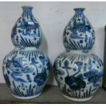 A pair of large Chinese blue and white double gourd shaped porcelain vases
