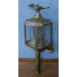 A brass carriage lamp