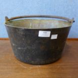 A Victorian brass jam pan