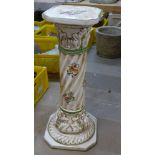 An Italian porcelain jardiniere stand