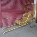 A vintage 1970's cane rickshaw