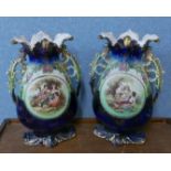 A desk top terrestrial globe and a pair of Celtic porcelain two handled vases