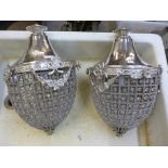 A pair of French Empire style pear shaped chandeliers