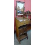 A Victorian Aesthetic Movement gentleman's mahogany shaving stand