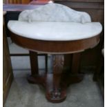 A Victorian mahogany and marble topped demi-lune washstand