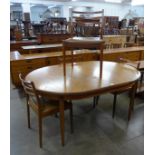 A G-Plan Fresco teak extending dining table and four chairs