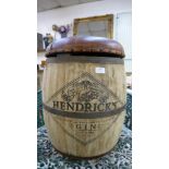 A beech and brown leather topped Hendrick's Gin advertising stool