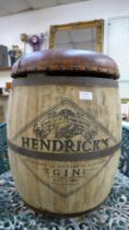 A beech and brown leather topped Hendrick's Gin advertising stool