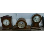 Two Edward VII inlaid walnut mantel clocks and an oak mantel clock