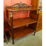 A 19th Century French Empire style mahogany and brsss inlaid three tier dumb waiter