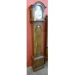 A Queen Anne style figured walnut dwarf longcase clock