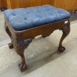 A George I style carved mahogany stool