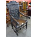 A 17th Century style carved oak Wainscott chair