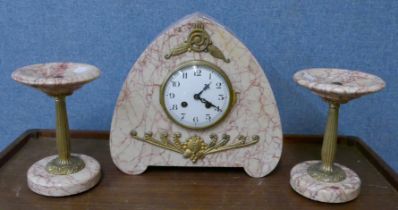 A French Art Deco marble and parcel gilt mantel clock garniture