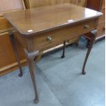 A George III style mahogany single drawer side table