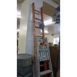 Two painter's ladders and a painter's tin
