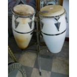 A pair of percussion drums on stand