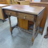 A Victorian Aesthetic Movement mahogany two drawer drop-leaf side table