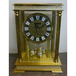 A gilt metal anniversary clock