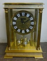 A gilt metal anniversary clock