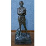 A bronze figure of a female office worker