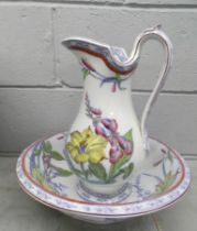 A Lily pattern water jug and bowl **PLEASE NOTE THIS LOT IS NOT ELIGIBLE FOR POSTING AND PACKING**