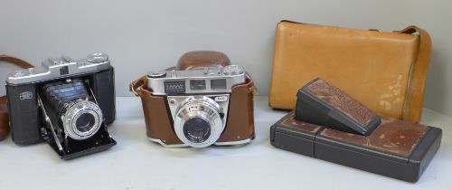 Three cameras, two Kodak and a Polaroid