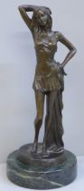 A bronze statue of a lady on a marble base, signed, 30cm