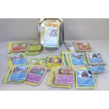 Over 400 holographic Pokemon cards and a tin